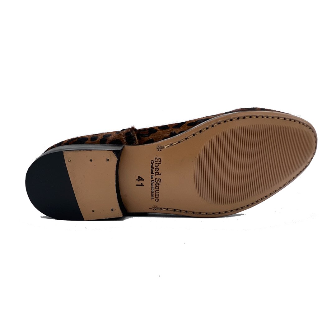 Light Leopard Loafer in light leopard-print hair-on leather, sole view with leather sole and low black heel